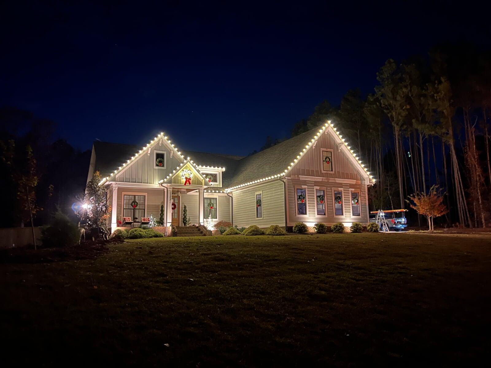 Home decorated with wreaths and warm white roof lighting